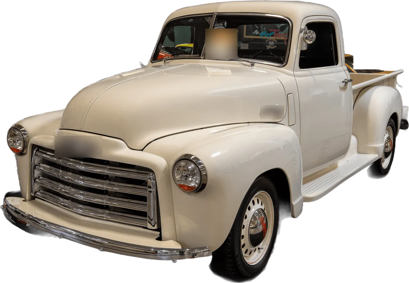 A white pickup truck parked on private property